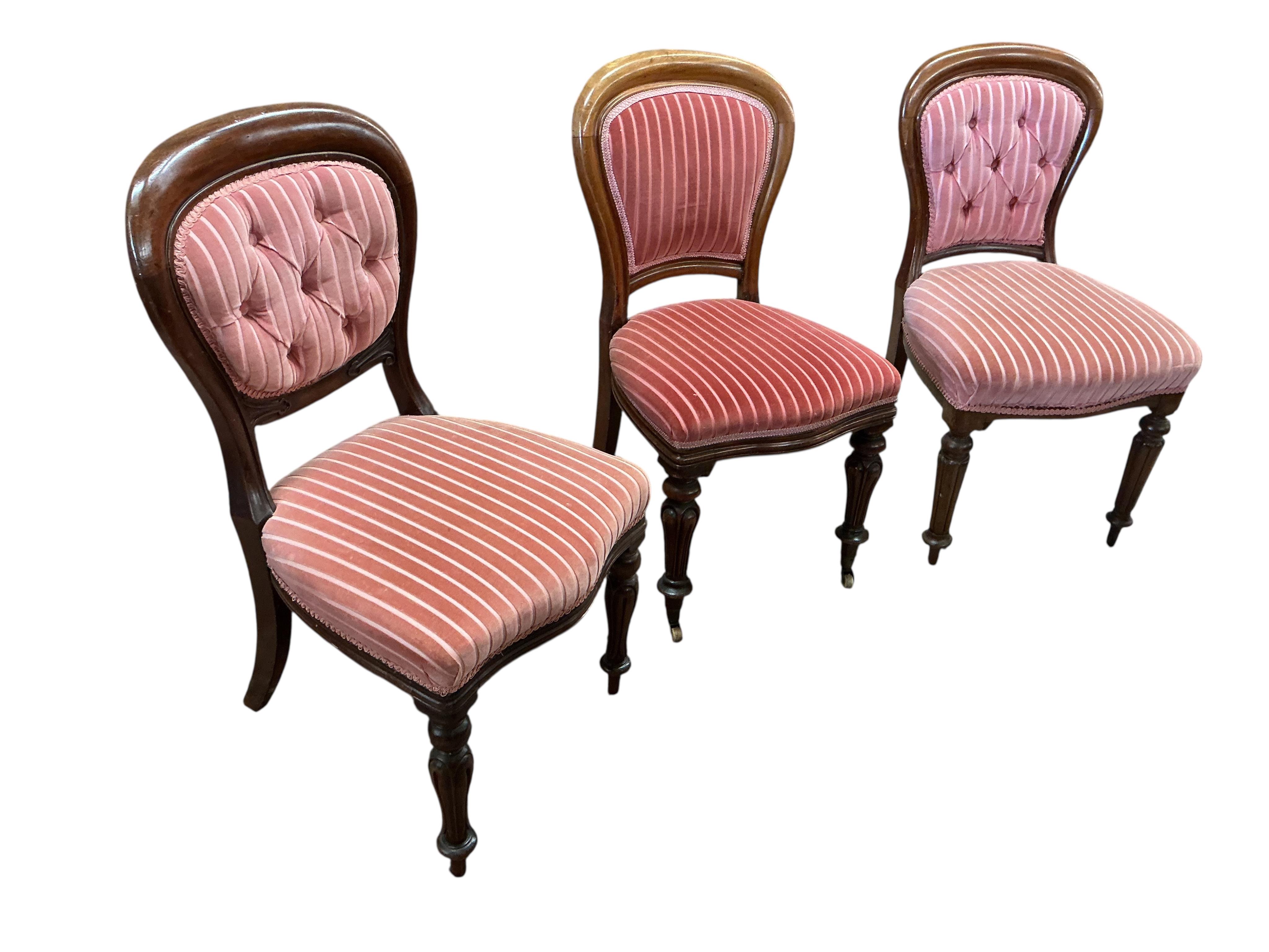 A harlequin set of nine mahogany balloon back dining chairs